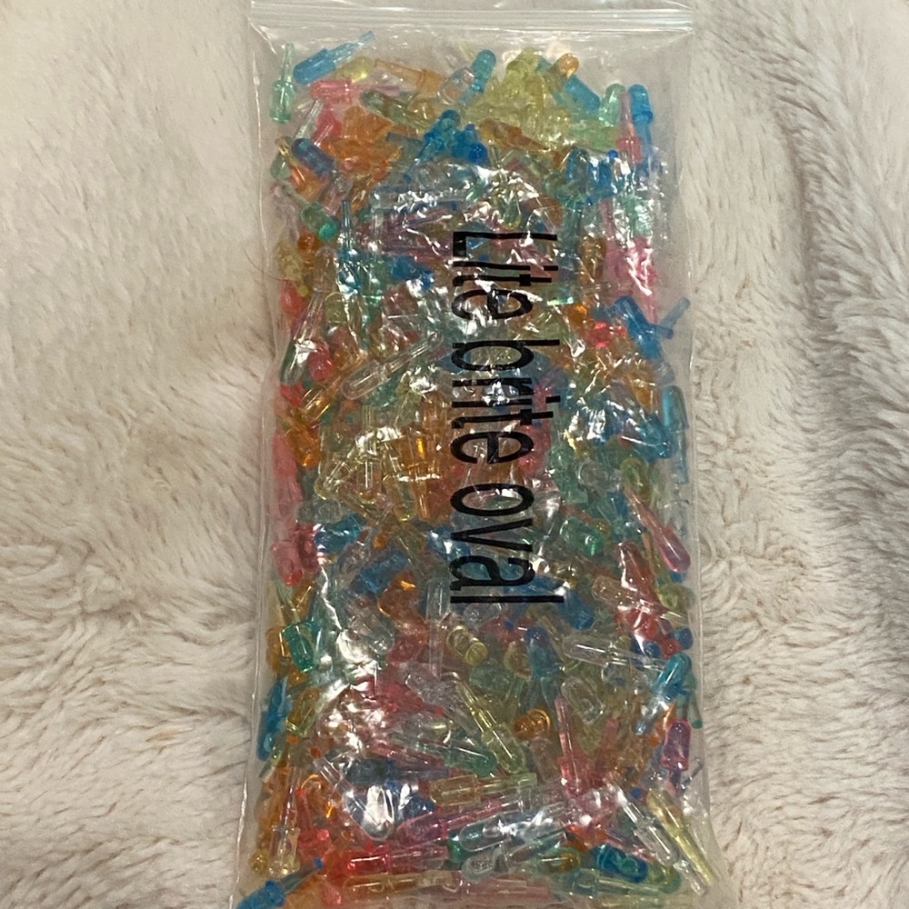 Lite Brite 4 ounce Bag Replacement Additional Multi Pastel-Colored Oval Pegs NWT